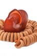 Shell with wood beads on the white background