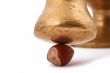 The Hazelnut and in the leaf old metal nutcracker
