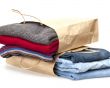 Shopping: jumper and jeans in paper packages