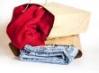 Shopping: jumper and jeans in paper packages