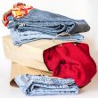 Shopping: jumper and jeans in paper packages