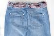 Women\'s jeans with motley silk belts