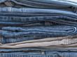 Jeans of indigo color on a show-window of shop