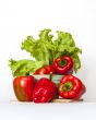 Large red paprika and bunch of fresh salad