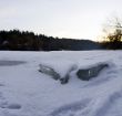 clear river ice in cold winter morning under sunbeams