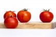 Red juicy tomatoes on the table