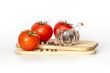 Red juicy tomatoes and black pepper