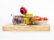 Black pepper, slices of tomato and containers