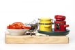 Black pepper, slices of tomato and containers