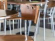 Tables and chairs in cafe in shopping center