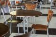 Tables and chairs in cafe in shopping center