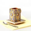Ceramic coffee cup with a square saucer