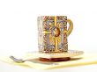 Ceramic coffee cup with a square saucer