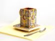 Ceramic coffee cup with a square saucer