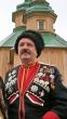 Ukrainian cossack general under wooden church