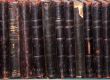 Row of old books cover spines