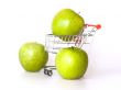 Large green apples in the cart for shopping