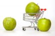 Large green apples in the cart for shopping