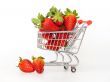 Large ripe strawberry in the cart for shopping