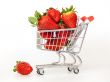 Large ripe strawberry in the cart for shopping