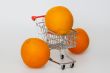 Large bright oranges in the cart for shopping