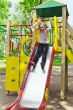 Active girl on nursery platform in summer