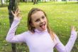 Cute girl with put out tongue