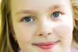 Cute girl with big blue eyes