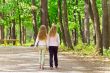 Cute two girls walking in park