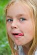 Cute girl with put out tongue
