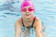 Cute girl in swimming pool