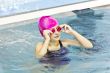 Cute girl in swimming pool