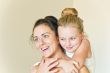 Mother and daughter in white
