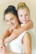 Mother and daughter in white