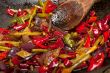 fried chili pepper and vegetable on a wok pan