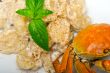 Italian gnocchi with seafood sauce with crab and basil