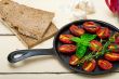 baked cherry tomatoes with basil and thyme