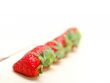fresh organic strawberry over white wood