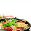 spaghetti pasta with baked cherry tomatoes and basil 