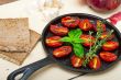 baked cherry tomatoes with basil and thyme