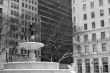 Pulitzer Fountain under the snow in black and white