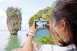 Women tourist shooting view by mobile phone