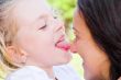 Kissing mother and daughter