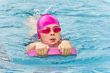 Cute girl in swimming pool