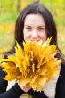 Brunette with bouquet from sheets