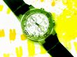 Stylish Wrist Watch on Patterned Yellow Background