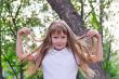 Cute girl playing with long hair