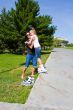 Learning mother and daughter on roller skates