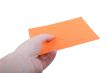 Hand with orange envelope