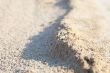 Sand surface with the relief formed by water 